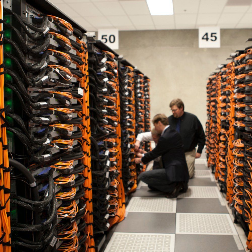 Server room with 3 engineers