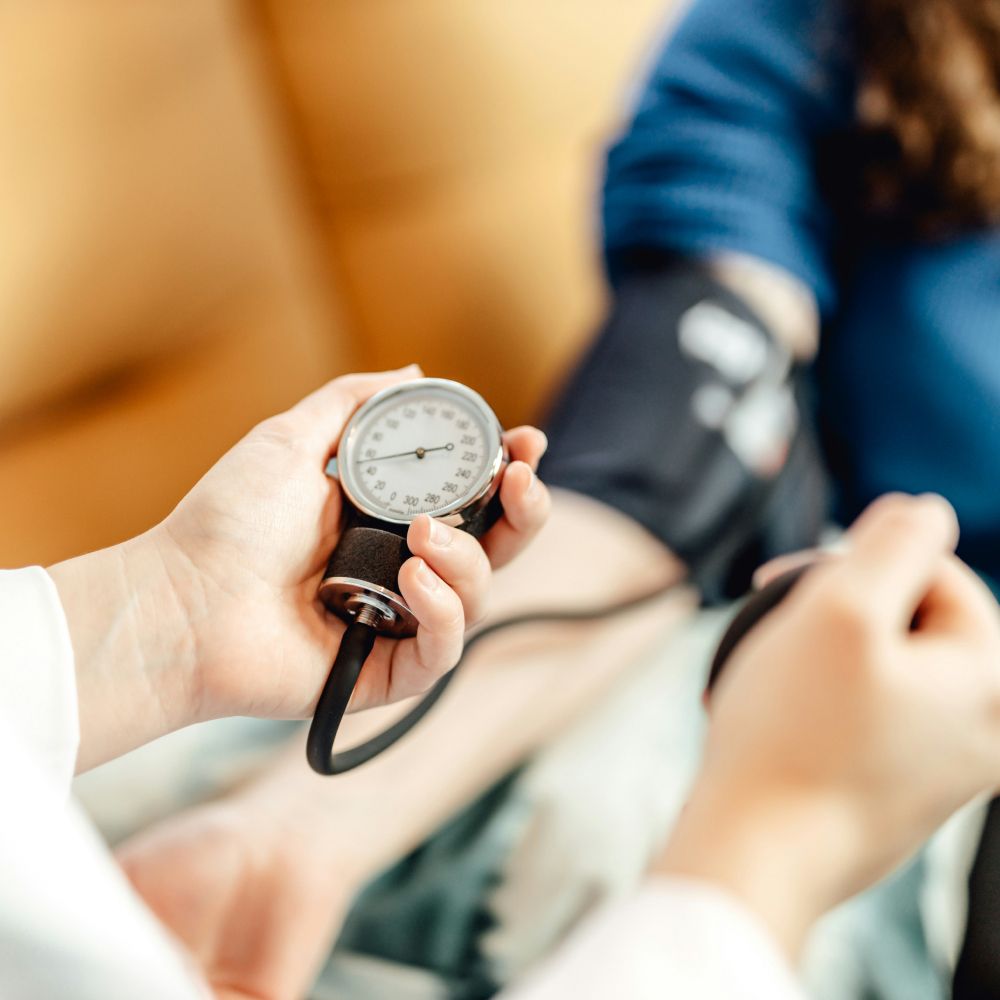 Person using a blood pressure monitor